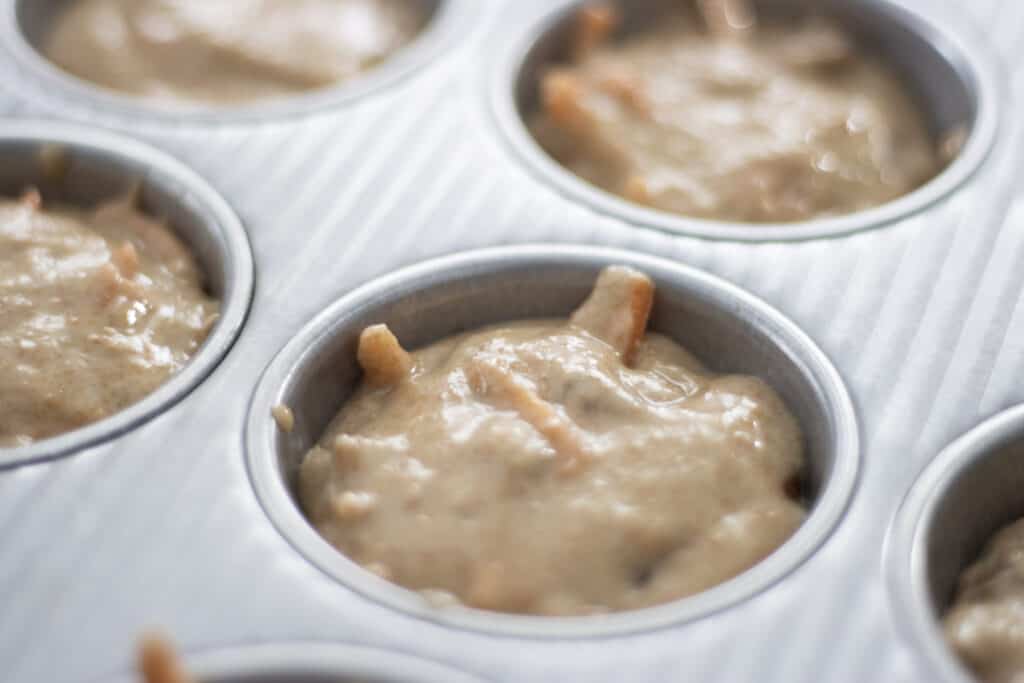 muffin batter in muffin tin