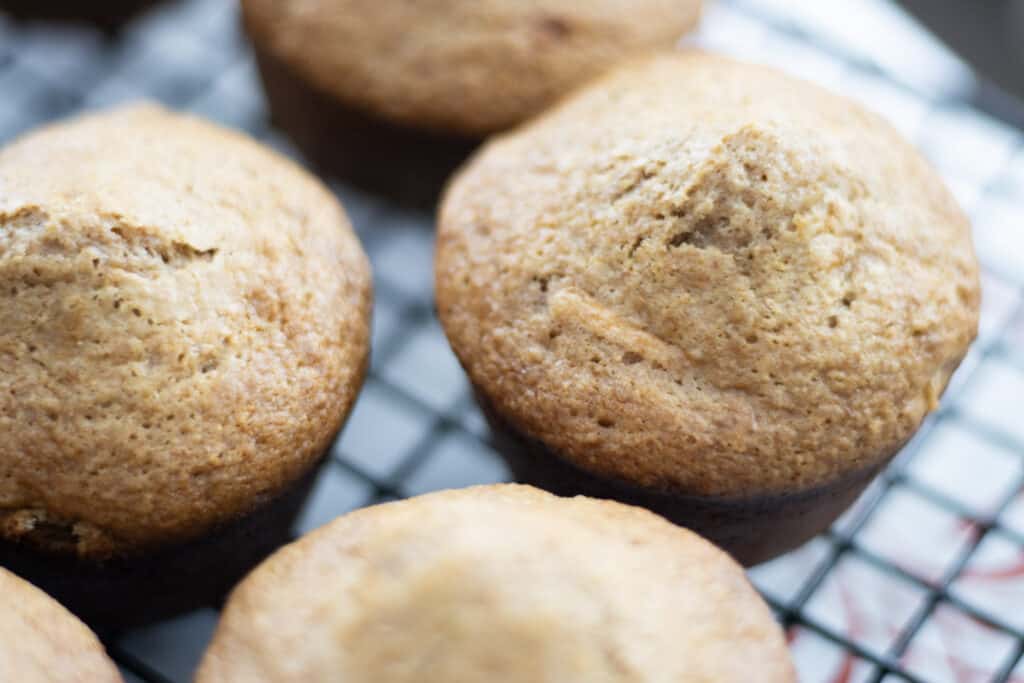 carrot cake muffins on cooling rack