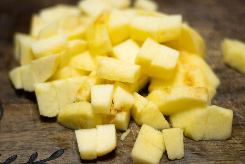 chopped apples on cutting board