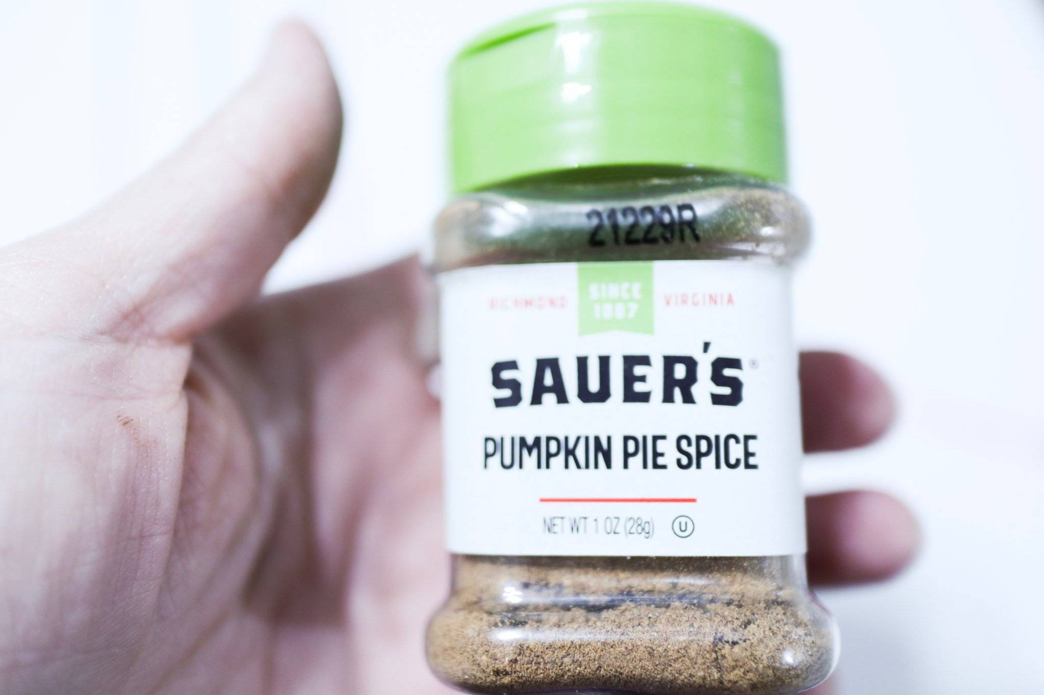 jar of pumpkin spice to flavor the homemade powdered coffee creamer