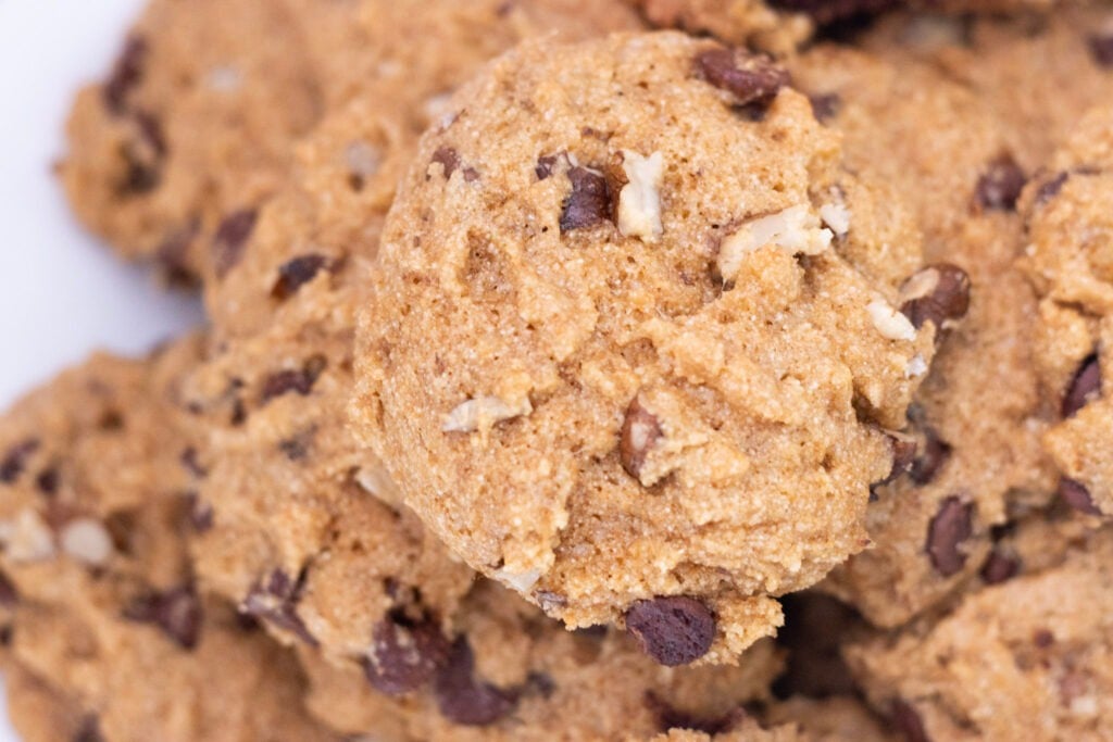 cookie sitting on top of a mound of other cookies