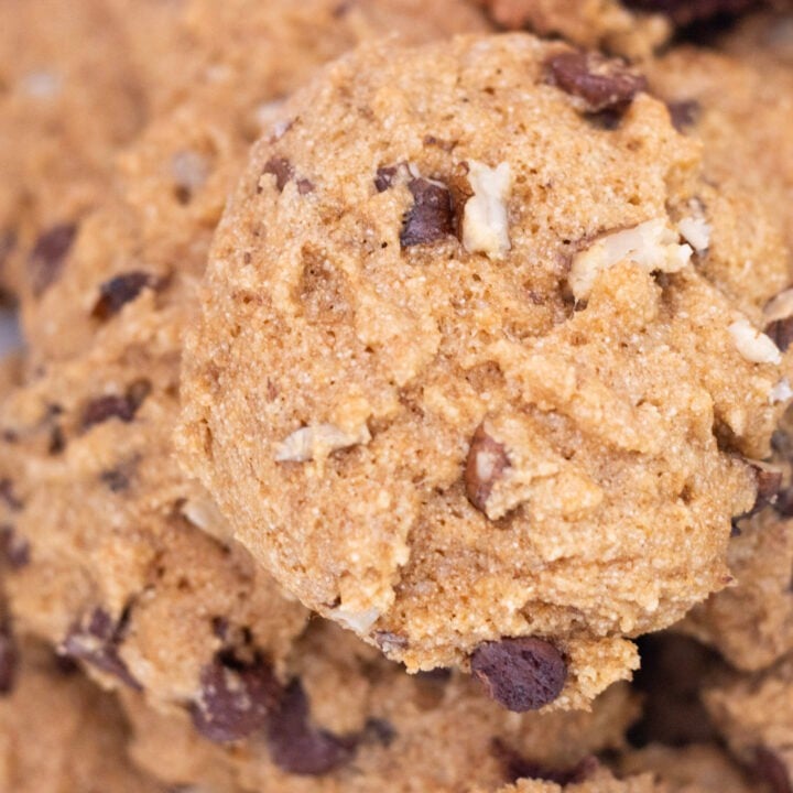 cookie sitting on top of a mound of other cookies