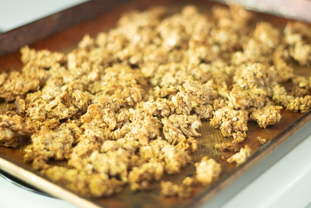 sourdough granola on a baking sheet