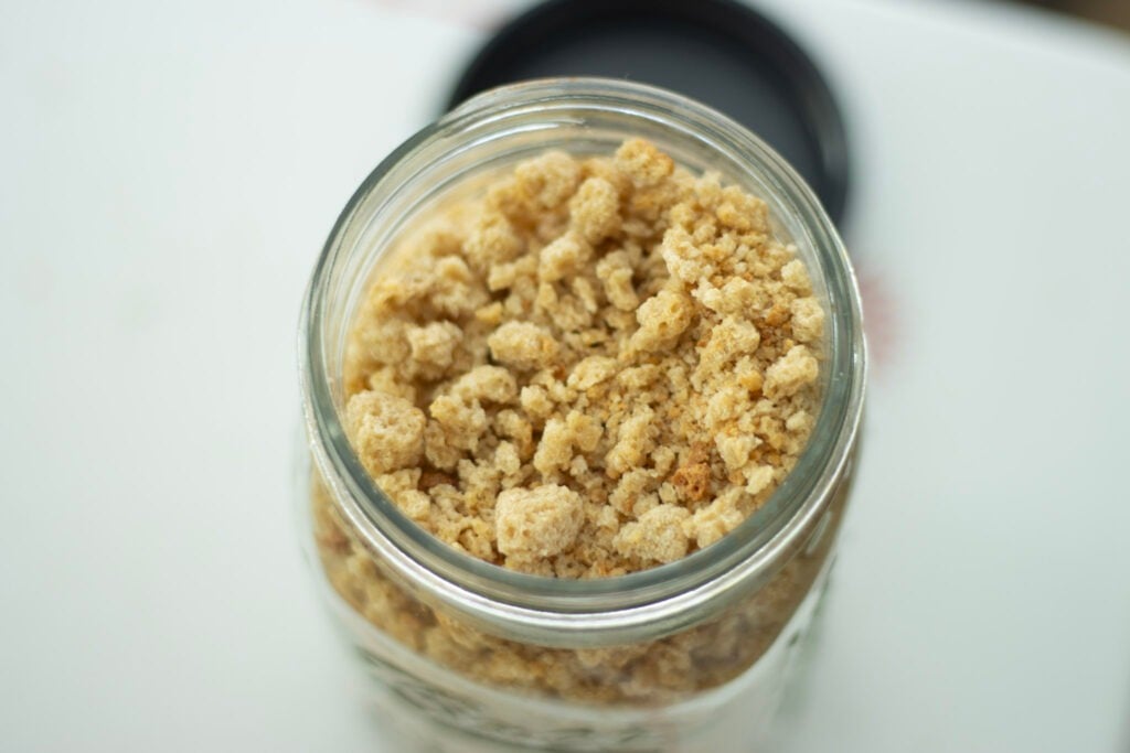 overhead shot of breadcrumbs in a jar