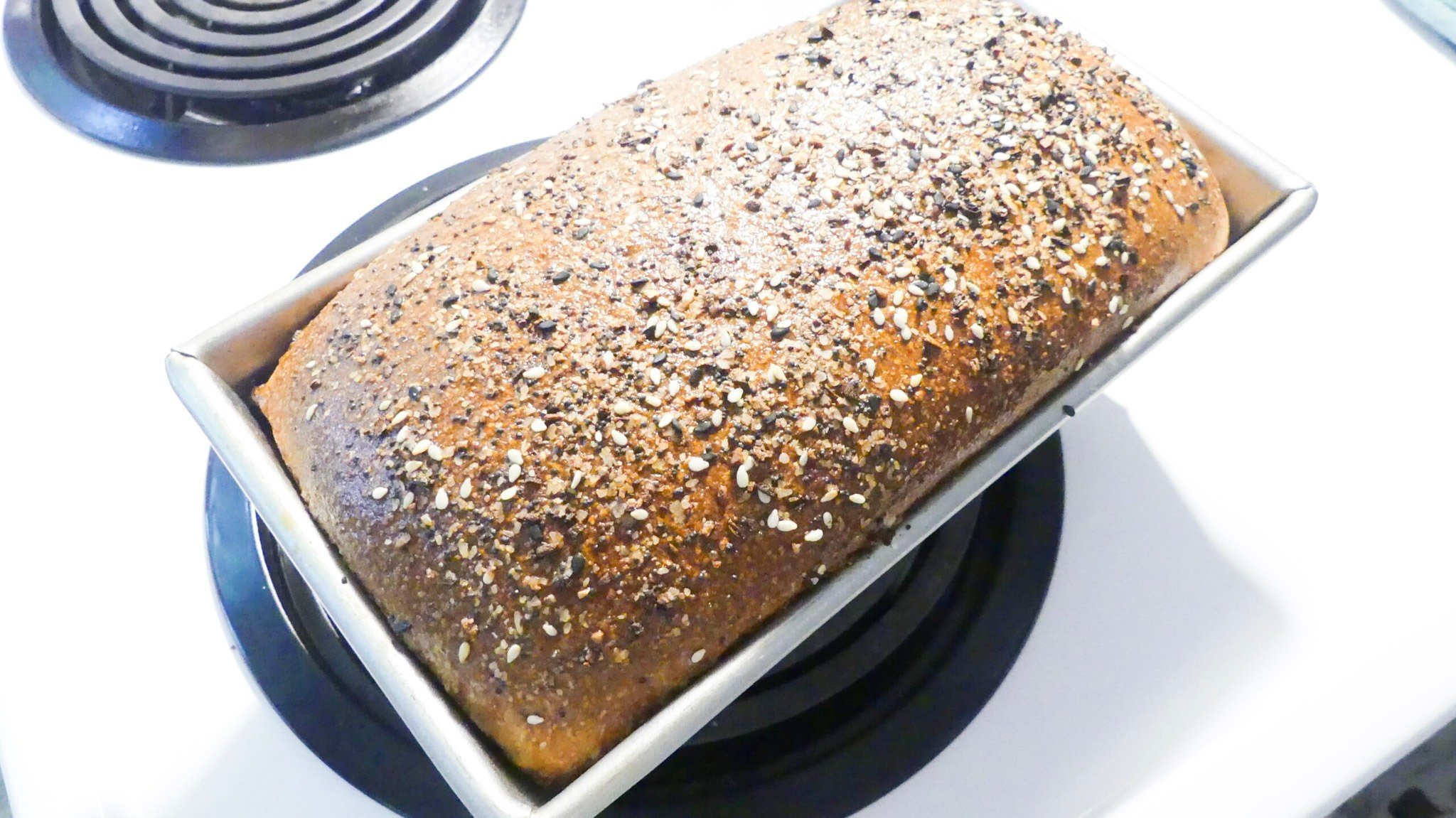 bread in loaf pan just out of the oven