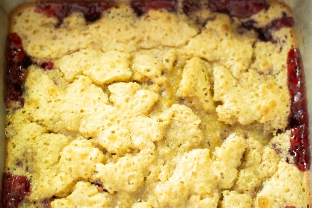 up close shot of berry cobbler just out of the oven