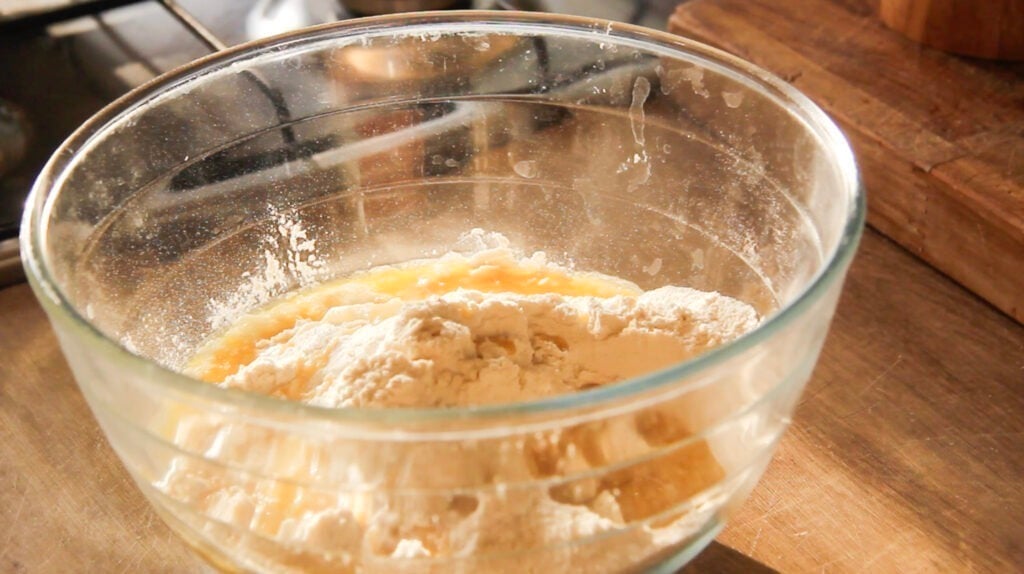 A bowl with dumpling ingredients ready to be mixed