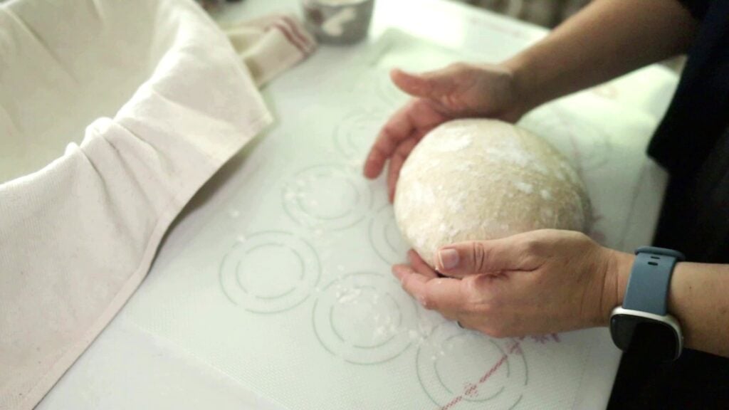 shaping a sourdough boule