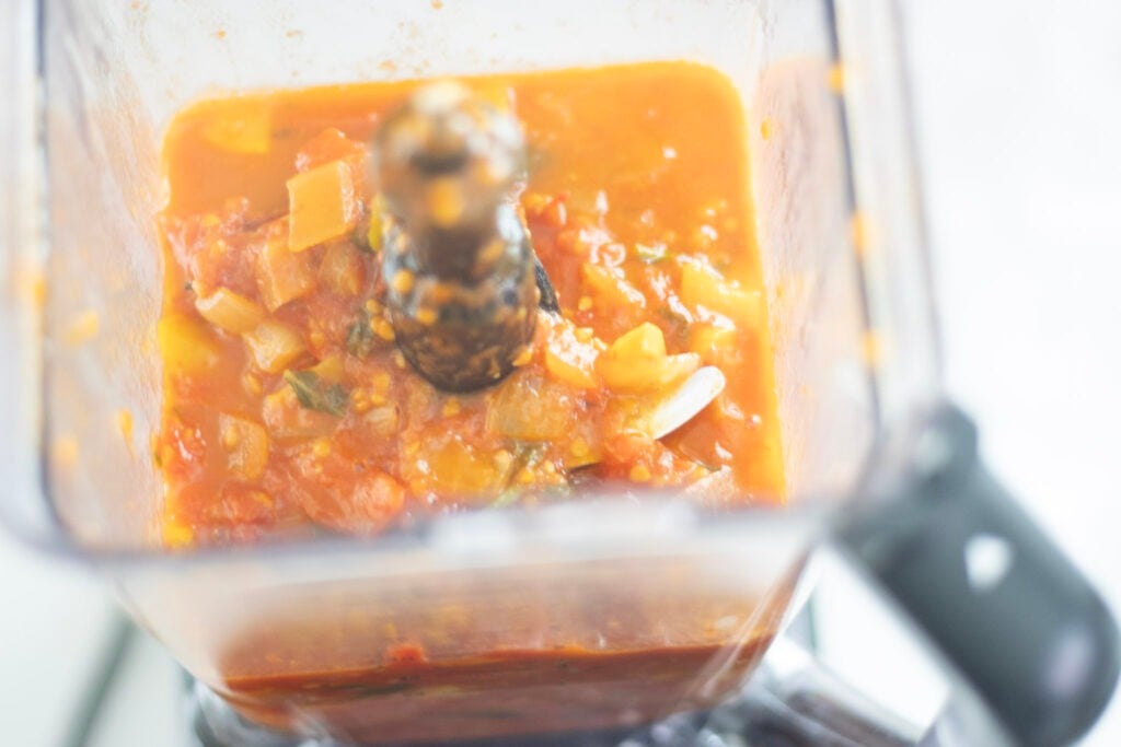 Roasted tomato sauce in blender ready to puree