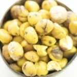 close up overhead view of chestnuts in a bowl