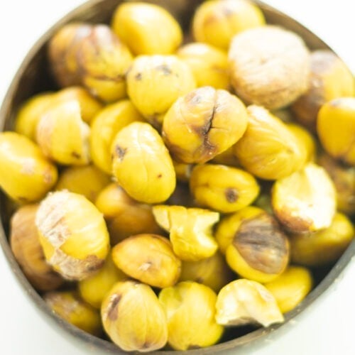 close up overhead view of chestnuts in a bowl