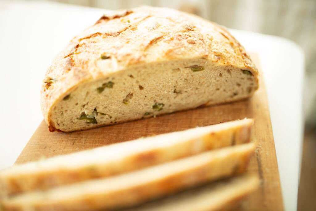 side view of sourdough jalapeno cheddar loaf showing crumb