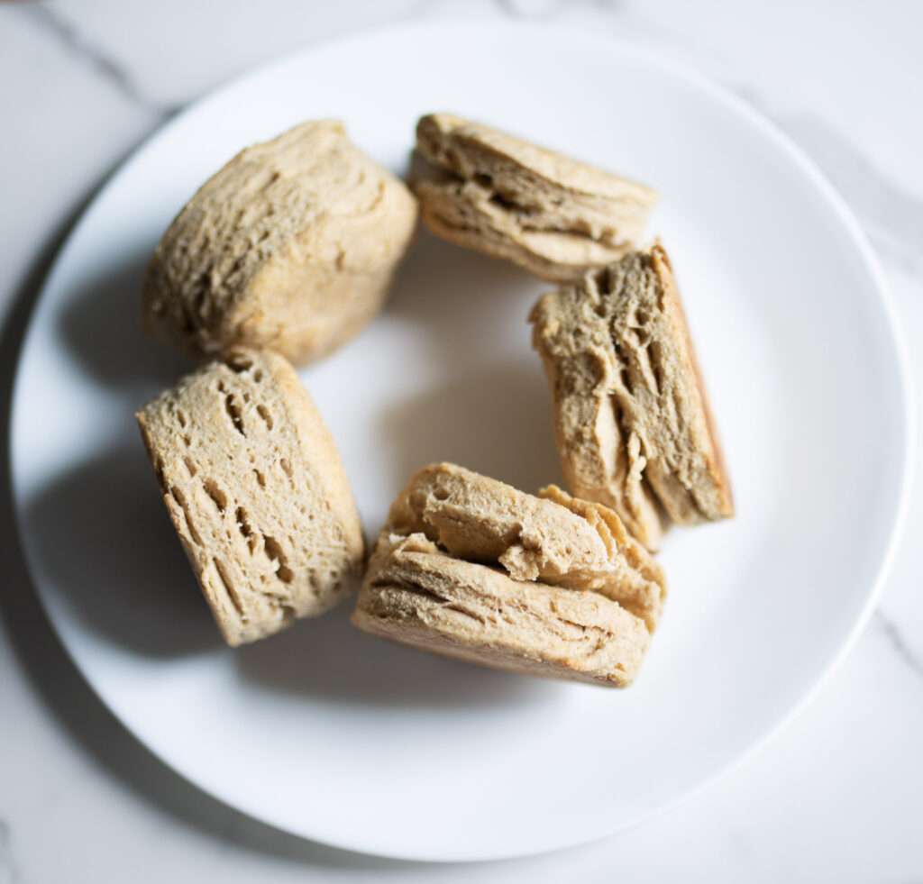 circle of fresh milled biscuits on a white plate