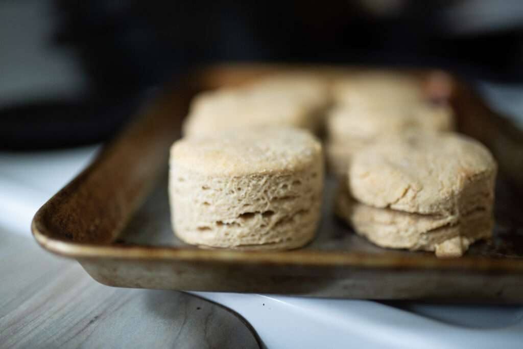 fresh milled biscuits on baking sheet showing layers