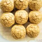 over head shot of sourdough pumpkin muffins on a cutting board