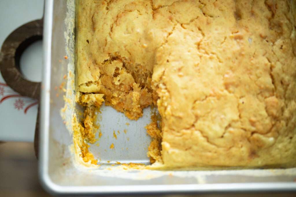 overhead of sourdough sweet potato casserole with one slice out
