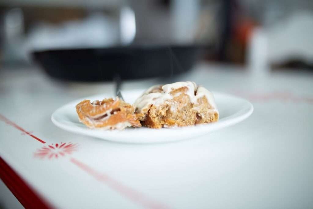 side view showing the crumb of a sourdough pumpkin cinnamon roll