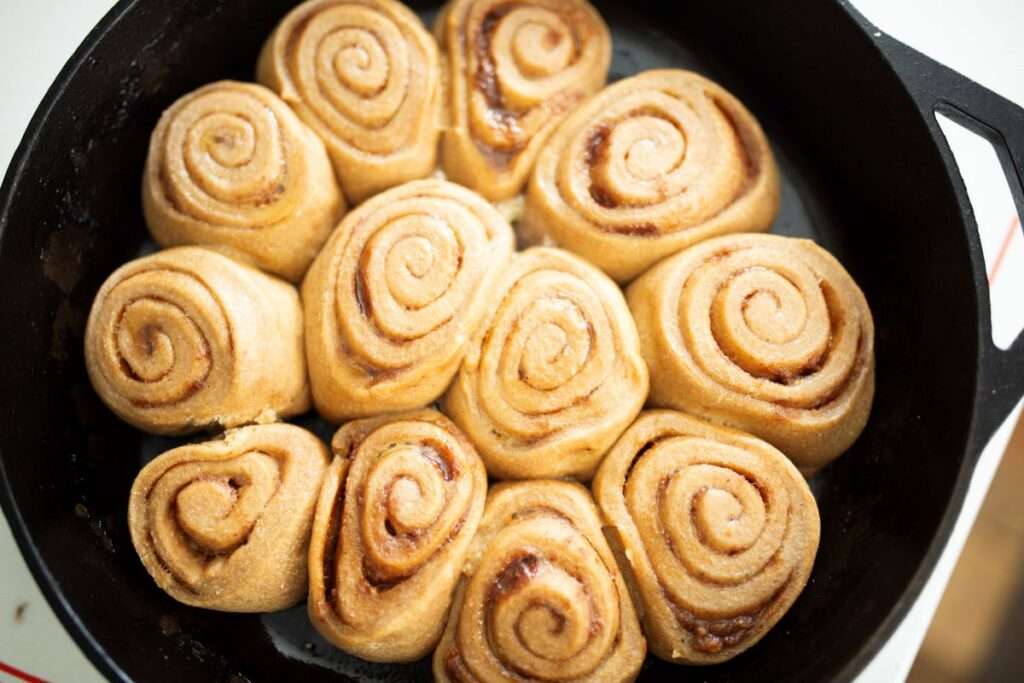 over head shot of sourdough pumpkin cinnamon rolls just out of the oven