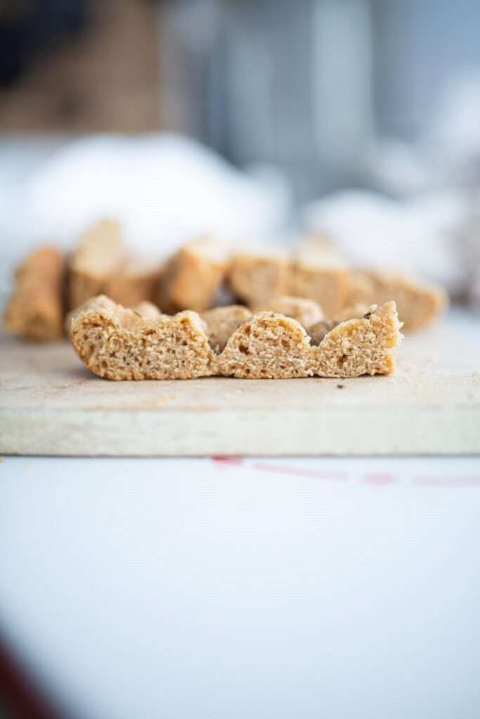A slice of fresh milled einkorn focaccia showing the crumb.