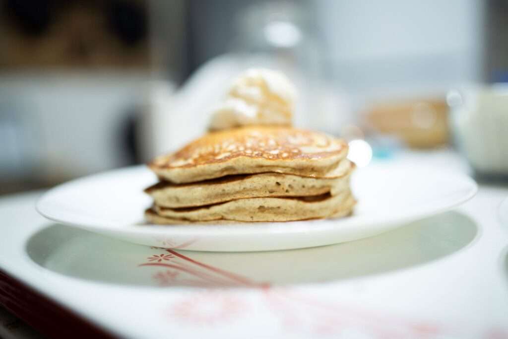Side photo of buckwheat pancakes to show how fluffy they are.