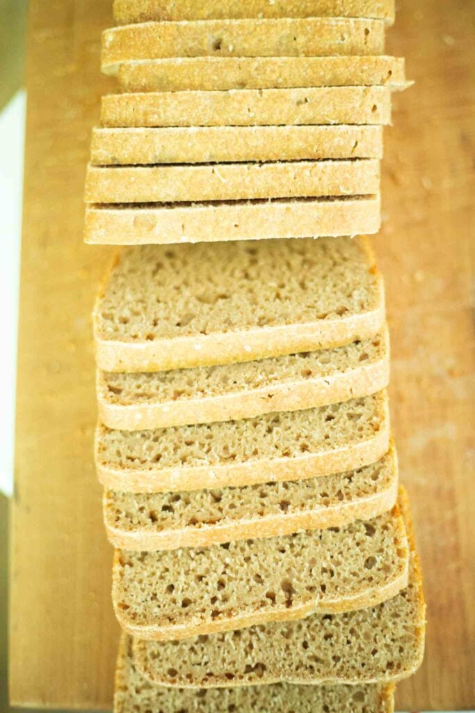 An overhead shot of a sliced loaf of sourdough emmer bread.