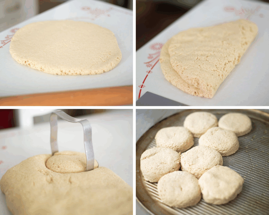 4 photos of making sourdough khorasan biscuits. 1. rolled out dough on a white table, 2. folded dough on the white table, 3. a biscuit cutter in the folded dough, 4. the cut biscuits on a baking sheet ready for the oven.