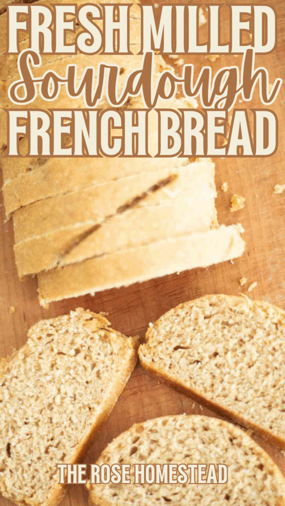 This is a pinterest pin for sourdough french bread. There is a photo of a sliced loaf with 3 slices laid out in front of the loaf. The text reads fresh milled sourdough french bread.