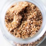 Oat free granola in a mason jar. It's golden brown.