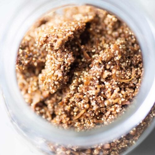 Oat free granola in a mason jar. It's golden brown.