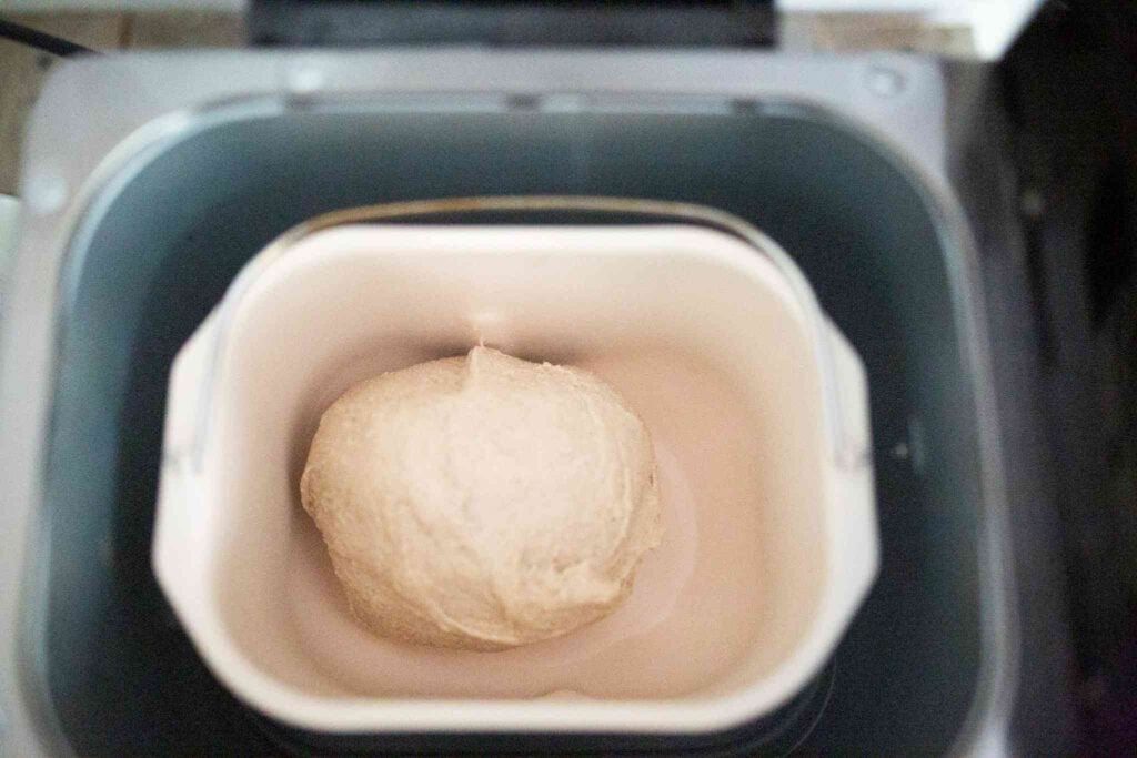 Dough is kneading in the bread machine.