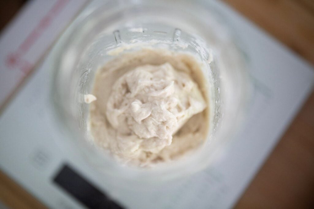 looking down into a jar of sourdough starter