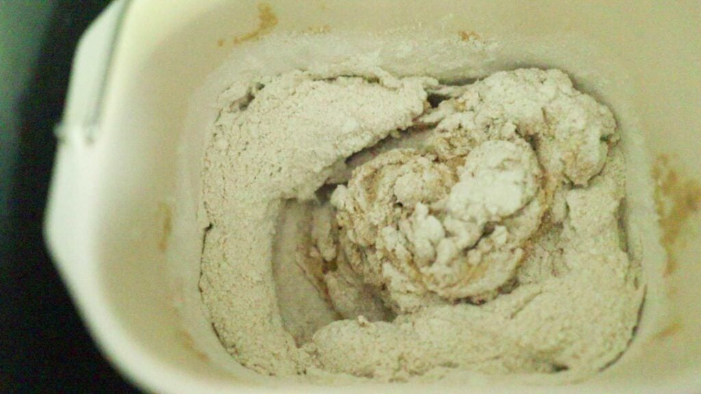 Dough mixing in a bread machine.